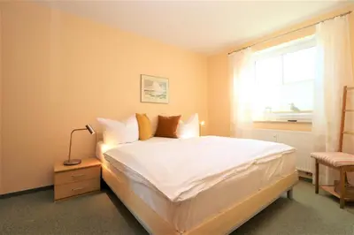 Ein Bett oder Betten in einem Zimmer der Unterkunft Altes Wasserwerk App 02