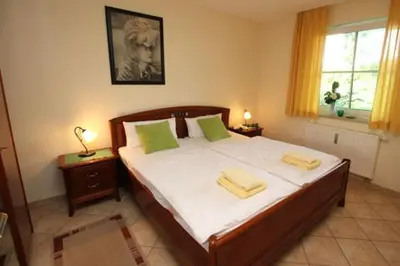 Ein Bett oder Betten in einem Zimmer der Unterkunft Altes Wasserwerk App 03
