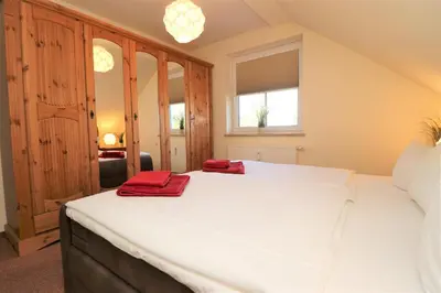 Ein Bett oder Betten in einem Zimmer der Unterkunft Altes Wasserwerk App 13