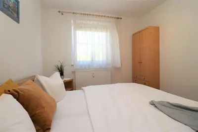 Ein Bett oder Betten in einem Zimmer der Unterkunft Altes Wasserwerk App 13