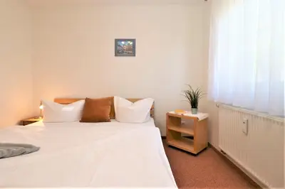 Ein Bett oder Betten in einem Zimmer der Unterkunft Altes Wasserwerk App 13