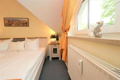 Ein Bett oder Betten in einem Zimmer der Unterkunft Altes Wasserwerk App 14
