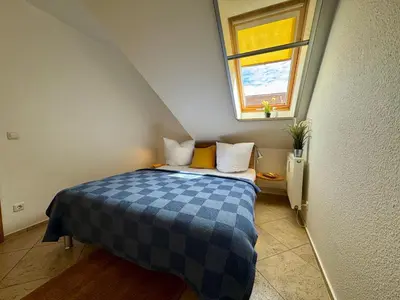 Ein Bett oder Betten in einem Zimmer der Unterkunft Altes Wasserwerk App 15