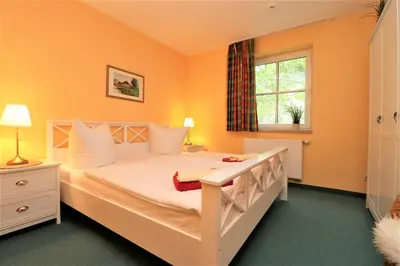 Ein Bett oder Betten in einem Zimmer der Unterkunft Birkenhof App 14