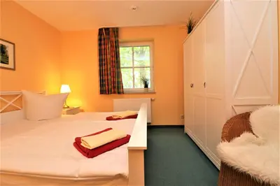 Ein Bett oder Betten in einem Zimmer der Unterkunft Birkenhof App 14
