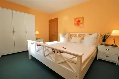 Ein Bett oder Betten in einem Zimmer der Unterkunft Birkenhof App 15