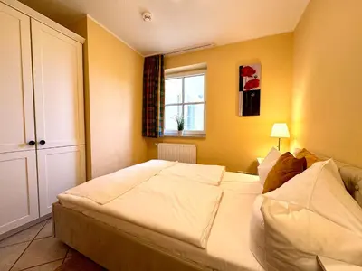Ein Bett oder Betten in einem Zimmer der Unterkunft Birkenhof App 15