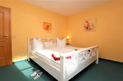Ein Bett oder Betten in einem Zimmer der Unterkunft Birkenhof App 15