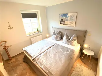 Ein Bett oder Betten in einem Zimmer der Unterkunft Birkenhof App 16, 