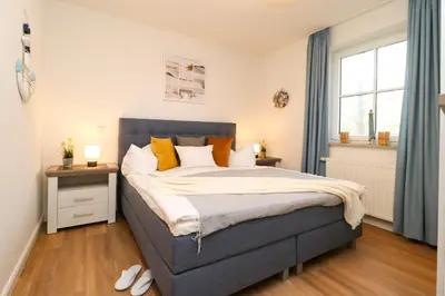 Ein Bett oder Betten in einem Zimmer der Unterkunft Birkenhof App 19