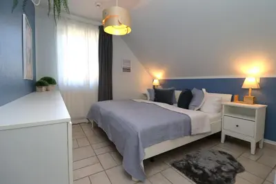 Ein Bett oder Betten in einem Zimmer der Unterkunft Birkenhof App 20