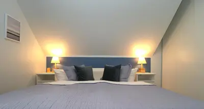 Ein Bett oder Betten in einem Zimmer der Unterkunft Birkenhof App 20