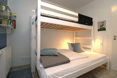 Ein Bett oder Betten in einem Zimmer der Unterkunft Birkenhof App 20