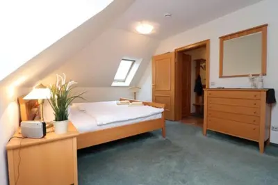 Ein Bett oder Betten in einem Zimmer der Unterkunft Birkenhof App 22