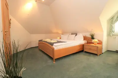 Ein Bett oder Betten in einem Zimmer der Unterkunft Birkenhof App 23