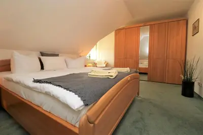 Ein Bett oder Betten in einem Zimmer der Unterkunft Birkenhof App 23