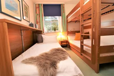 Ein Bett oder Betten in einem Zimmer der Unterkunft Birkenhof App 24