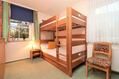 Ein Bett oder Betten in einem Zimmer der Unterkunft Birkenhof App 24