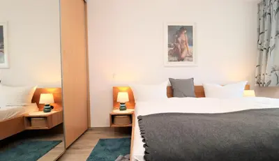 Ein Bett oder Betten in einem Zimmer der Unterkunft Birkenhof App 26, 