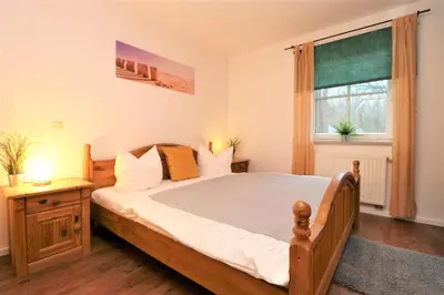 Ein Bett oder Betten in einem Zimmer der Unterkunft Birkenhof App 27