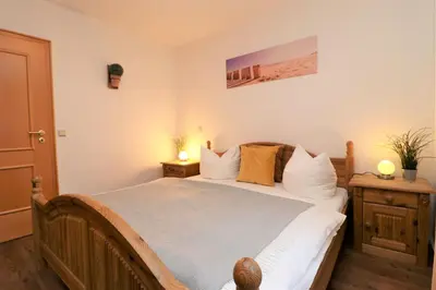 Ein Bett oder Betten in einem Zimmer der Unterkunft Birkenhof App 27