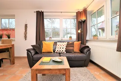 Ein Sitzbereich in der Unterkunft Birkenhof App 27