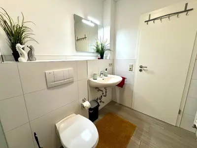 Ein Badezimmer in der Unterkunft Birkenhof App 28, Backbord