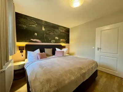 Ein Bett oder Betten in einem Zimmer der Unterkunft Birkenhof App 29
