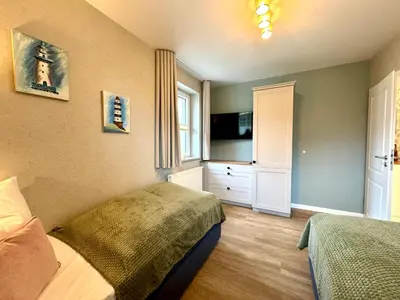 Ein Bett oder Betten in einem Zimmer der Unterkunft Birkenhof App 29