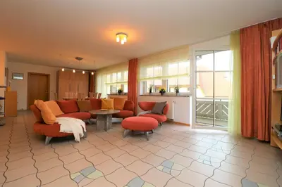 Ein Sitzbereich in der Unterkunft Birkenhof App 30, Piratenlager