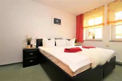 Ein Bett oder Betten in einem Zimmer der Unterkunft Birkenhof App 30, Piratenlager