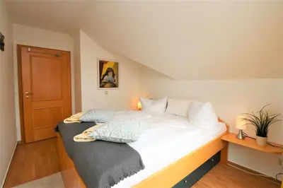 Ein Bett oder Betten in einem Zimmer der Unterkunft Birkenhof App 34