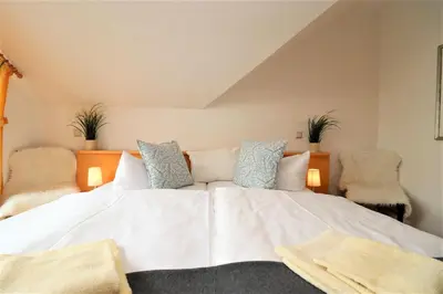 Ein Bett oder Betten in einem Zimmer der Unterkunft Birkenhof App 34