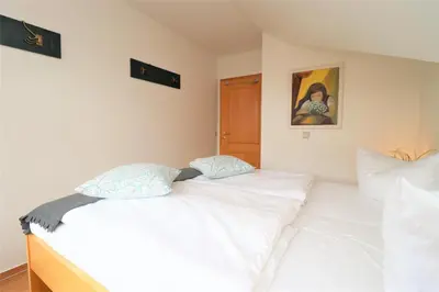 Ein Bett oder Betten in einem Zimmer der Unterkunft Birkenhof App 34