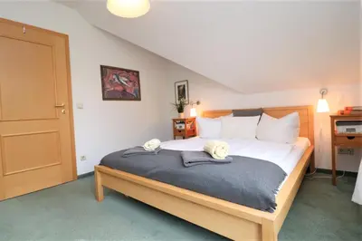 Ein Bett oder Betten in einem Zimmer der Unterkunft Birkenhof App 36