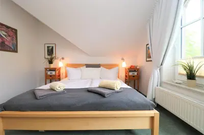 Ein Bett oder Betten in einem Zimmer der Unterkunft Birkenhof App 36