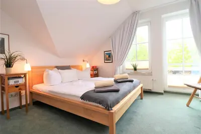Ein Bett oder Betten in einem Zimmer der Unterkunft Birkenhof App 36