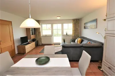 Ein Sitzbereich in der Unterkunft Birkenhof App 39
