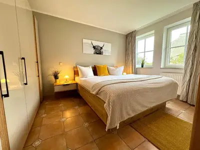 Ein Bett oder Betten in einem Zimmer der Unterkunft Birkenhof App 39