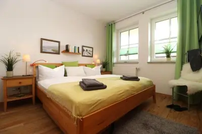 Ein Bett oder Betten in einem Zimmer der Unterkunft Birkenhof App 42