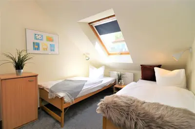 Ein Bett oder Betten in einem Zimmer der Unterkunft Birkenhof App 43