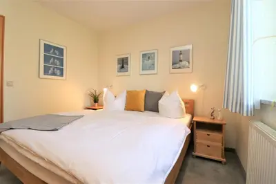 Ein Bett oder Betten in einem Zimmer der Unterkunft Birkenhof App 43
