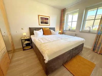 Ein Bett oder Betten in einem Zimmer der Unterkunft Birkenhof App 44