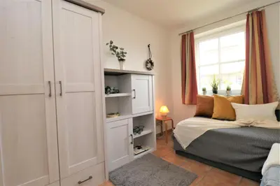 Ein Bett oder Betten in einem Zimmer der Unterkunft Birkenhof App 46