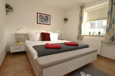 Ein Bett oder Betten in einem Zimmer der Unterkunft Birkenhof App 46