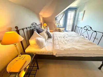 Ein Bett oder Betten in einem Zimmer der Unterkunft Birkenhof App 48