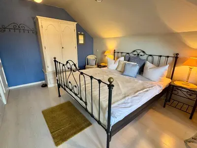 Ein Bett oder Betten in einem Zimmer der Unterkunft Birkenhof App 48