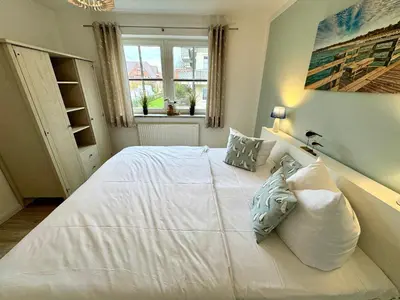 Ein Bett oder Betten in einem Zimmer der Unterkunft Birkenhof App 64
