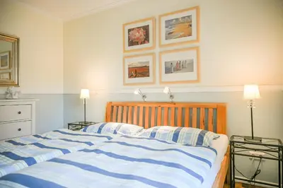 Ein Bett oder Betten in einem Zimmer der Unterkunft Birkenhof App 65 