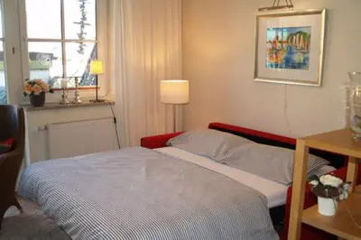 Ein Bett oder Betten in einem Zimmer der Unterkunft Birkenhof App 65 